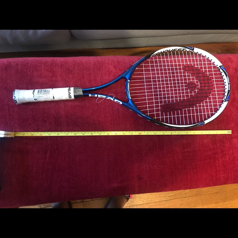 COPY - New tennis racquet comes with tennis balls.